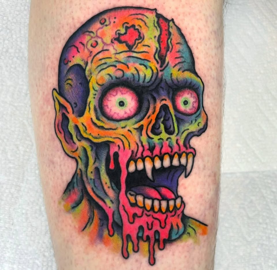 Dripping neon zombie skull tattoo